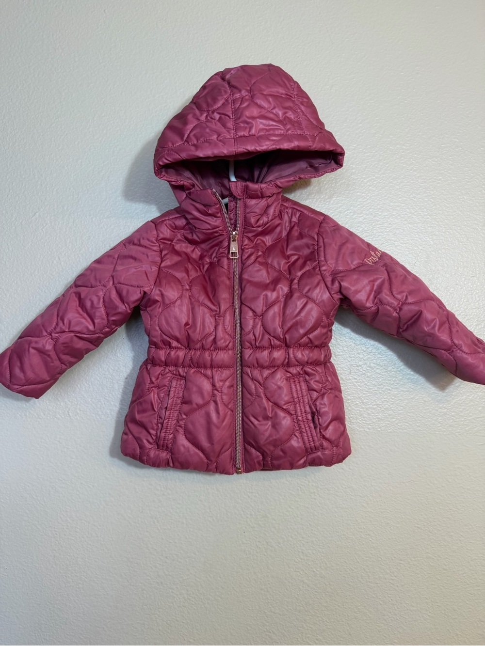 Pistachio girls' jacket features a quilted diamond pattern and a front zipper 2T